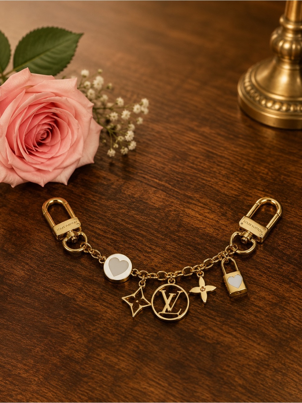 Gold and Light Pink Charm Purse With Heart and LV Motifs